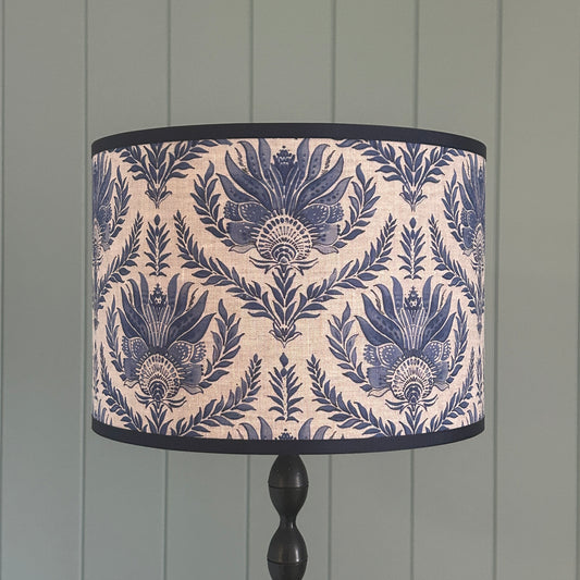 Blue and natural linen fabric lampshade with navy trim top and bottom