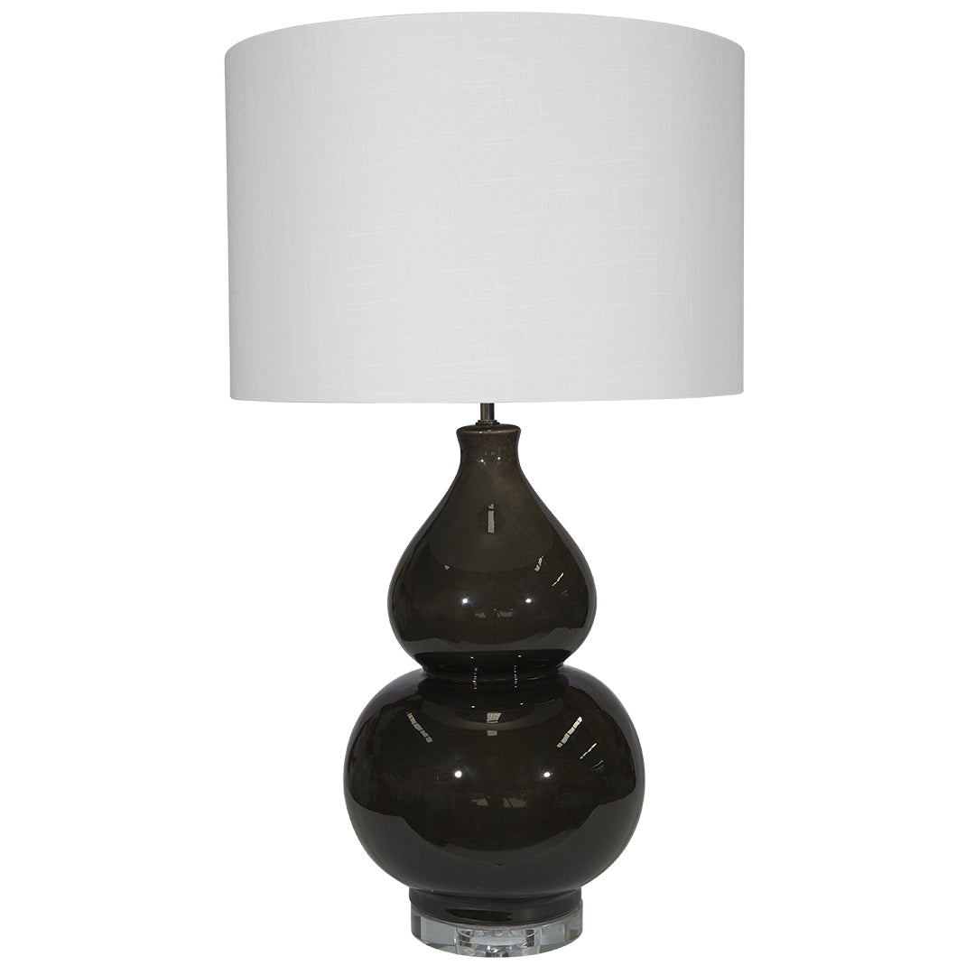 Black table lamp with a white shade on a white background