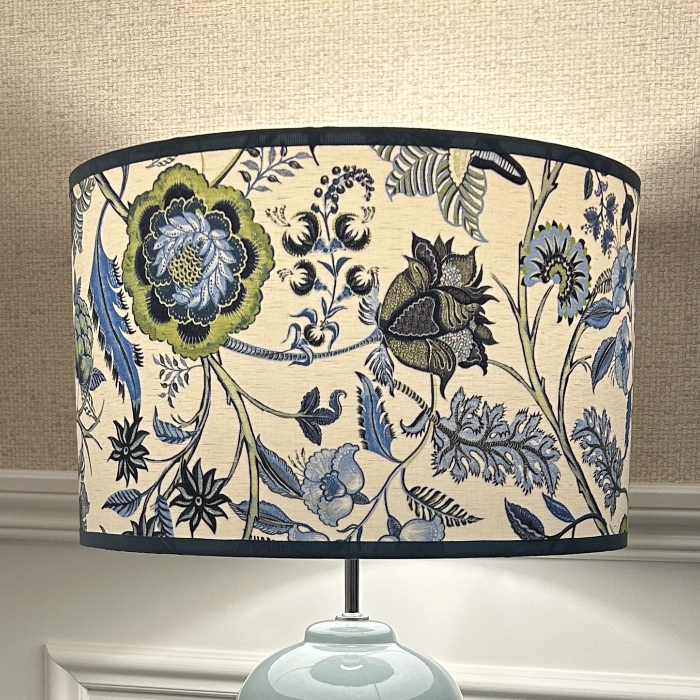 Floral chintz patterned lampshade on a neutral background