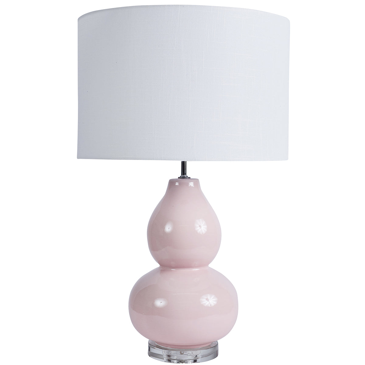 Pink table lamp with a white shade on a white background