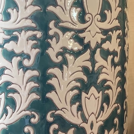 Closeup short video of the blue green and white ceramic detail of the lamp
