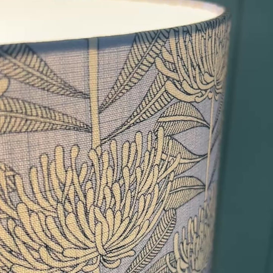 Floral patterned lampshade with protea botanical native floral design fabric Video showing closeup