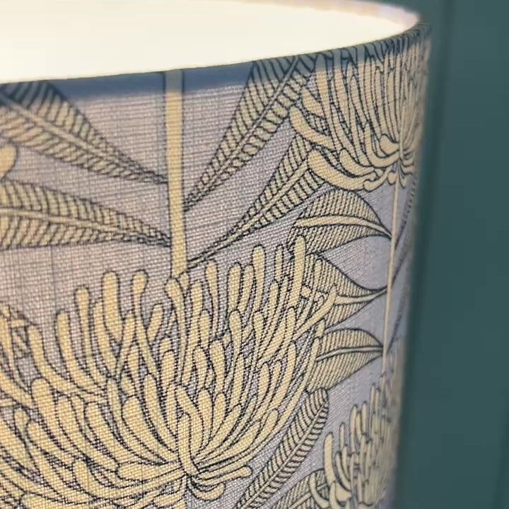 Floral patterned lampshade with protea botanical native floral design fabric Video showing closeup
